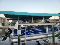 waterfront home, in a canal of the Caloosahatchee River with direct Gulf access.