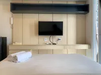 Cozy and Simply Look Studio Room Tokyo Riverside Pik 2 Apartment Hôtels à : Teluknaga