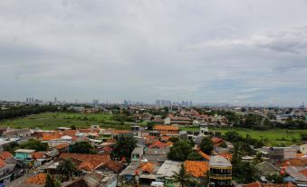 Minimalist Studio Apartment at Poris 88 with City View