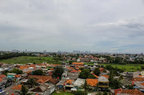 Minimalist Studio Apartment at Poris 88 with City View