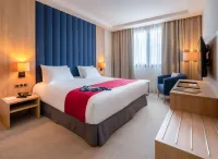 Golden Tulip Royaume Отели в г. 