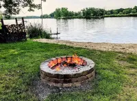 Charming 3 Bed Lake House in Wonderful Dowling with AC, WiFi, Dock, and Kayaks.