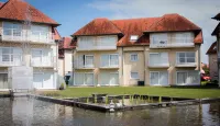 Holiday Suites de Haan Hotels in 