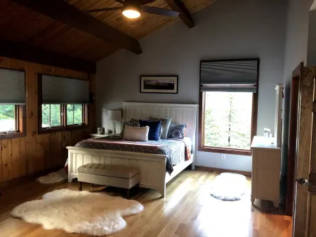 WELCOME TO ON THE ROCK - A RECENTLY RENOVATED  BEAUTIFUL LAKE FRONT HOME