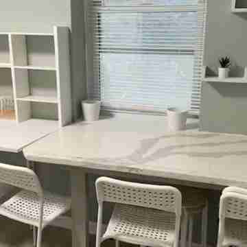 Discover Charm City from a Cozy Retreat Dining/Meeting Rooms