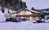 萊德勒自行車加白雪餐廳酒店 - 民宿