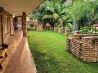 Mumo Lodge Отели в г. Badplaas