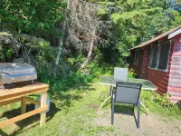 Rustic Log Cabin #8 on Crow Lake at Bull Moose Lodge. Family and pet friendly