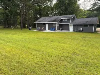 Year-round 3BR/2BA trailside house & 4 electric campsites near Lake Missaukee