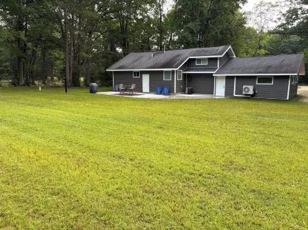 Year-round 3BR/2BA trailside house & 4 electric campsites near Lake Missaukee