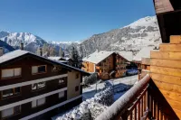 Views of Bruson & Petit Combin range from the top floor of the Alpine residence