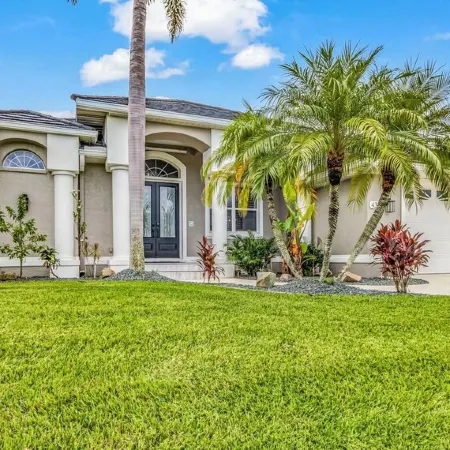 WOW! Luxury Punta Gorda waterfront home; HEATED POOL, golf community; WOW factor
