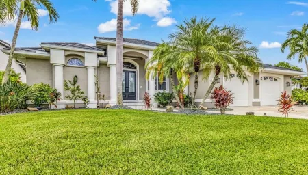 WOW! Luxury Punta Gorda waterfront home; HEATED POOL, golf community; WOW factor