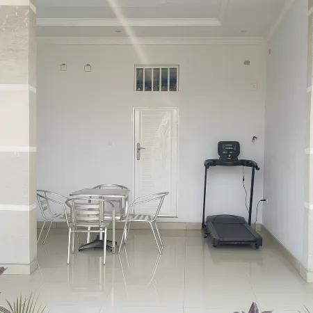 Cozy Guest Room in Kinshasa with Balcony and Partial Air-Conditioning