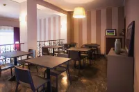 โรงแรมดิปอร์ตาโรมานา - พร้อมอาหารเช้า