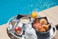 Logis Hôtel le Rodin - servizio colazione