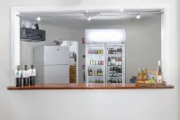 Mossman Resort Holiday Villas - bar