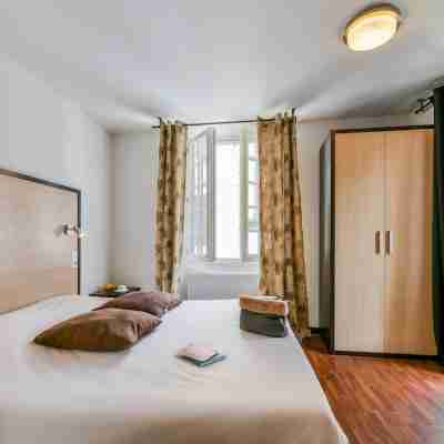 Logis Hôtel le Commerce Rooms