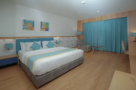 Cubix Hotel Отели в г. Дхарвад