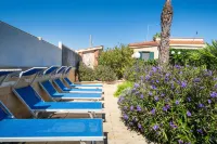 Apartment Tritone in Luxury Villa with Shared Pool Hotels in Torre Lapillo