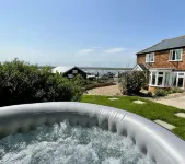 Cosy Coastal 2-Bedroom Cottage with Hot Tub & Log Burner