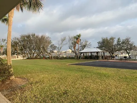 Ground floor condo with walk out access to docks, fishing piers and pool