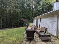 Lake Norman Charming Cottage with AC ,WiFi, Fire Pit and Grill in Mooresville.