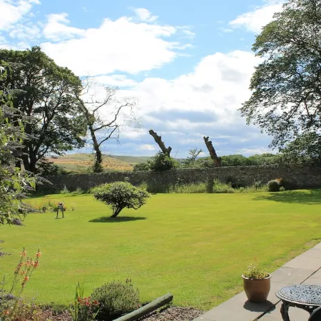 2 bedroom cottage, with far reaching views of the garden and open countryside.