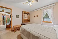 Large private lot.  Beautiful cabin with a stream and trout pond!