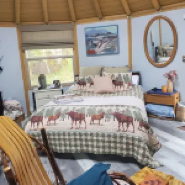 Fanciful mountainside yurt with private bathhouse