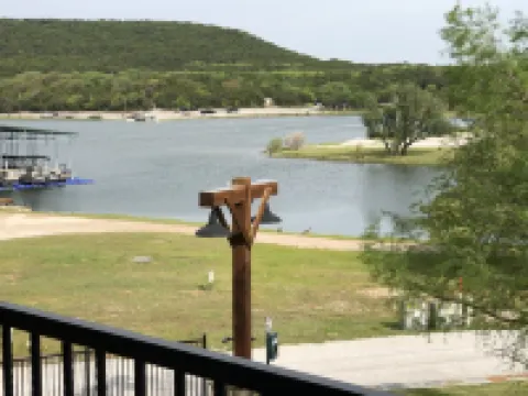 Lake front Condo 2BD/2BA w/ pool, hot tub, fire pit, gas grills, gym, & laundry.