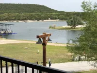 Lake front Condo 2BD/2BA w/ pool, hot tub, fire pit, gas grills, gym, & laundry.