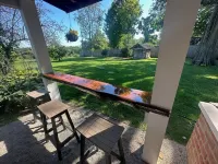 Historic Log Cabin fully restored; gourmet kitchen & much more!