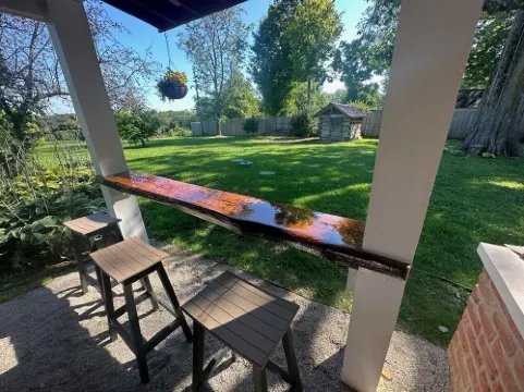 Historic Log Cabin fully restored; gourmet kitchen & much more!