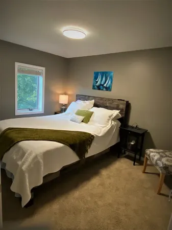 Cozy Black River Cottage with Private Dock and Boat Hoist-Sleeps 6