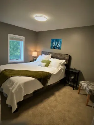 Cozy Black River Cottage with Private Dock and Boat Hoist-Sleeps 6