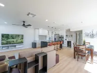 Steam and Rainfall showers, Chef's kitchen, king beds, 75 inch TV