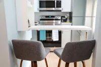 Modern studio cottage with private patio and parking