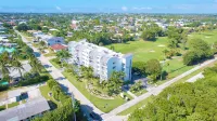 Stylish 2BR, 2BA Apartment with Balcony & Pool - Just Steps from the Beach - 4-Star