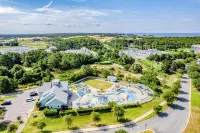 4-story dog-friendly home near beach with decks, pool, gym, washer/dryer, & AC