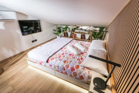 Flytosuite Aeroporto Attico Mansarda Отели рядом с достопримечательностью «Museo Lamborghini»