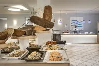 Blu Hotel Laconia Village - Frühstück