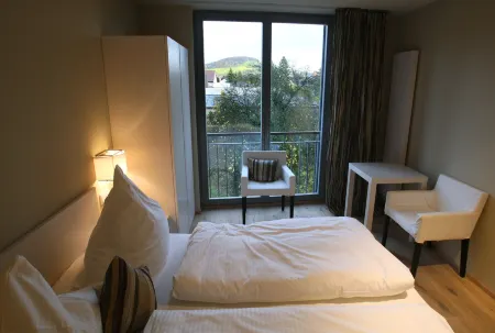 Weingut Gästehaus Weigand Отели в г. Ипхофен