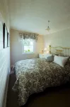 Illalangi Boutique Cottage - balcony