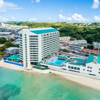 Alupang Beach Tower Отели рядом с достопримечательностью «Подводный мир»
