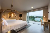 Tau House Отели в г. Гуатапе