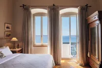 Syrou Melathron Hotels near Lazareta