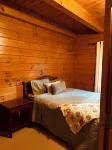 4-bedroom cabin in peaceful Apple Valley with AC, WiFi. Enjoy nature retreat.