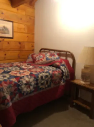 Cozy Cabin in the Woods in a Relaxing Area with Wrap Around Porch Rocking Chairs