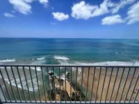 Luquillo Oceanfront Balcony Suite Near El Yunque with Private Beach Access
